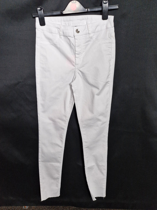 White Buttoned Skinny Jeans